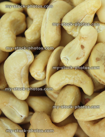 Stock image of cashew nuts, heap of cashews, healthy eating snack food