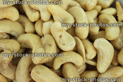Stock image of cashew nuts / high protein, pile of cashews, healthy snack food