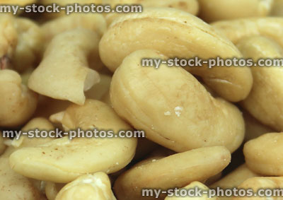 Stock image of cashew nuts close up, pile of cashews, healthy snacks, diet food