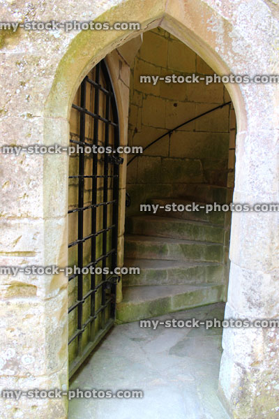 Stock image of medieval castle archway / door with iron gate, 14th century
