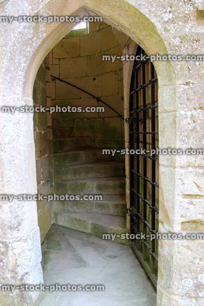 Stock image of medieval castle archway / door with iron gate, 14th century