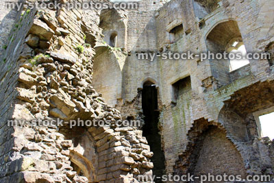 Stock image of crumbling medieval castle ruins, slowly falling down