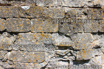 Stock image of ancient cobblestone brick wall, part of medieval castle ruins
