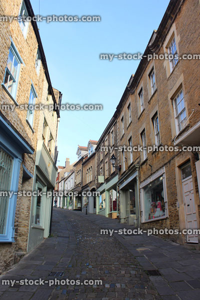 Stock image of medieval shops and houses, cobblestone street / Catherine Hill, Frome, Somerset England
