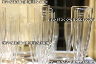 Stock image of empty plastic champagne flutes / wine glasses at wedding reception