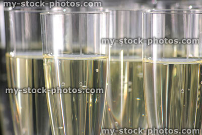 Stock image of plastic champagne flutes / sparkling wine glasses at wedding reception
