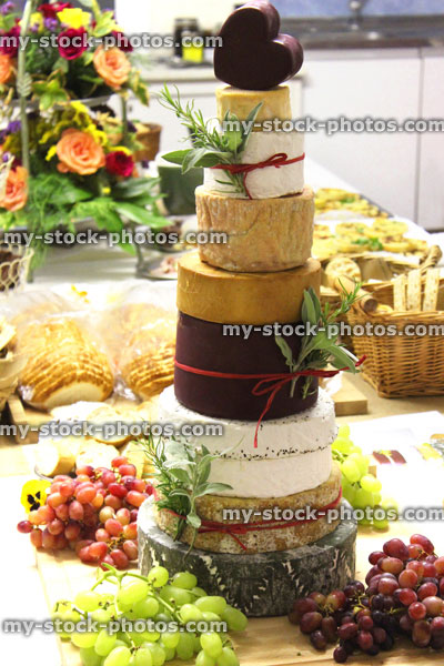 Stock image of wedding celebration cheese cake with brie, Stilton, Cornish Yarg and Cheddar