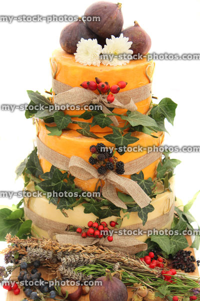 Stock image of cheese wedding cake, decorated cheese cake, Cheddar, Red Leicester