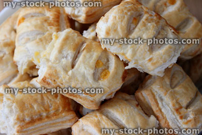 Stock image of vegetarian sausage rolls, cheese and onion, puff pastry