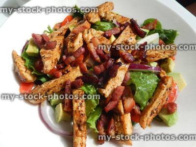 Stock image of chicken, pancetta ham / bacon salad, avocado, spinach, avocado