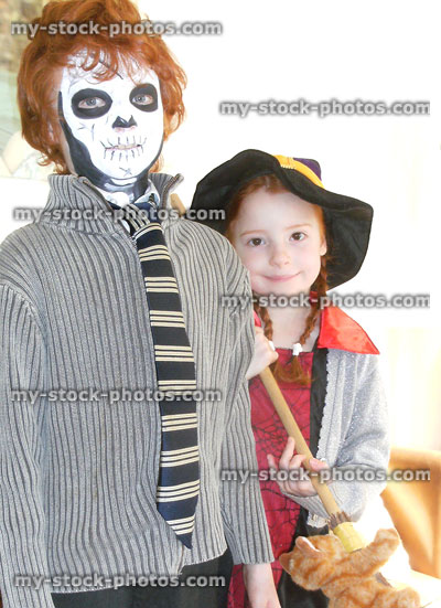 Stock image of children / boy and girl in Halloween fancy dress