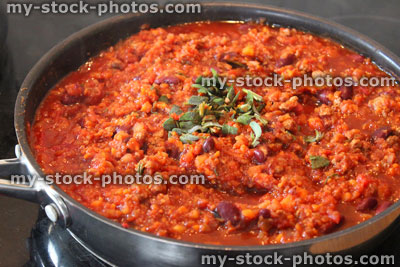 Stock image of healthy vegetarian chili con carne cooking, frying pan