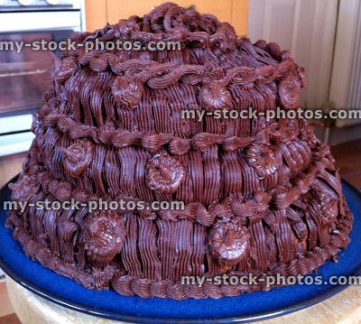 Stock image of gateau covered in chocolate icing
