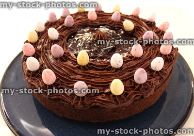 Stock image of Easter chocolate cake with rich ganache icing / frosting