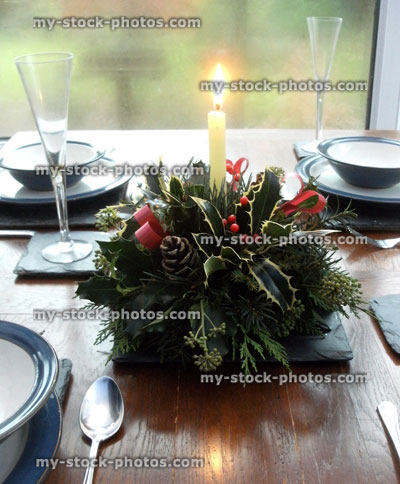 Stock image of Christmas table centrepiece with candle