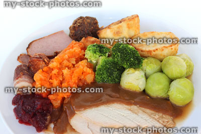 Stock image of Sunday roast Christmas turkey dinner, Brussels sprouts, roast-potatoes