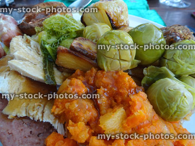 Stock image of roast dinner, mashed carrot / swede, sprouts, gravy, roast-onions
