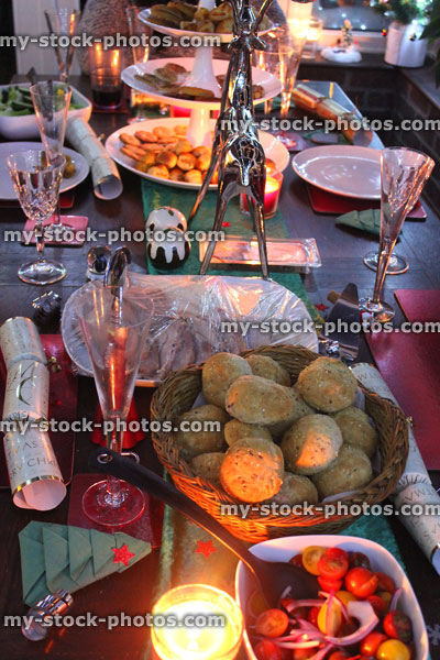 Stock image of dining table set for evening Christmas meal / buffet food