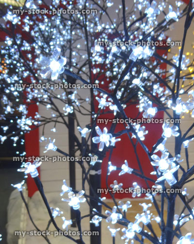 Stock image of flower shaped Christmas tree fairy lights, twinkling flower xmas lights