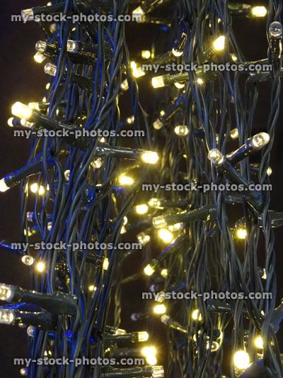 Stock image of tangled white Christmas tree fairy lights, twinkling xmas lights