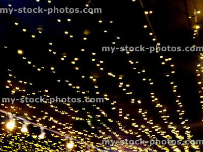 Stock image of defocused strings of white Christmas fairy lights background, bokeh