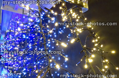 Stock image of defocused blue and white Christmas lights background, bokeh