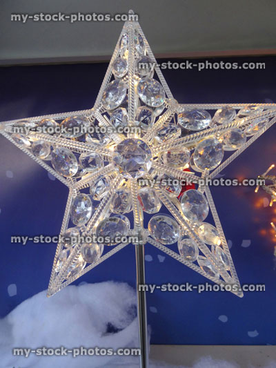 Stock image of Christmas tree topper decoration silver, crystal Christmas star