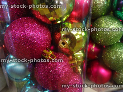 Stock image of Christmas tree decorations, shiny / sparkling / glitter baubles, pink blue gold green
