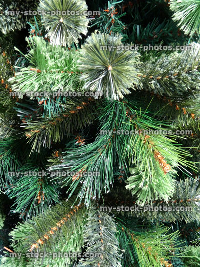 Stock image of artificial Christmas tree foliage (close up), frosted with fake snow