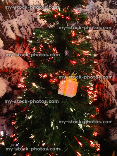 Stock image of fibre optic Christmas tree, twinkling needle foliage, red lights 