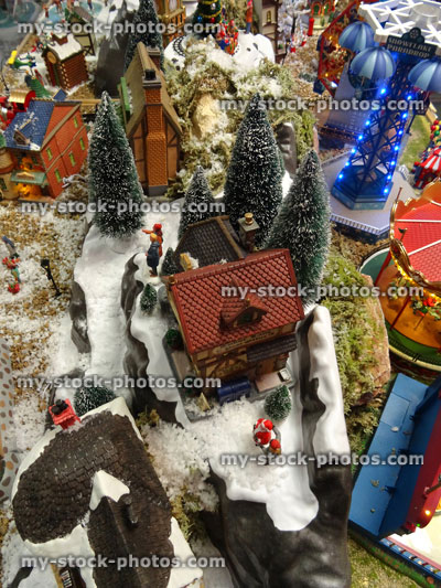 Stock image of model Christmas village with miniature houses, rooftops, winter scene