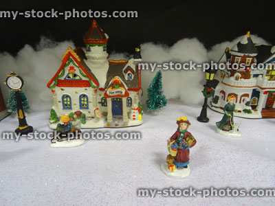Stock image of model Christmas village with miniature houses, people, toy shop