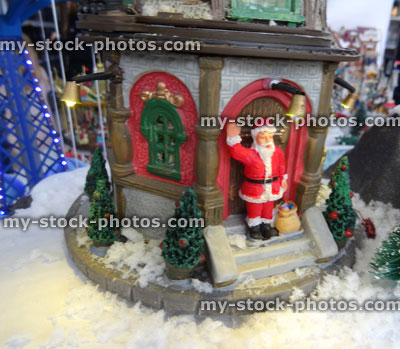 Stock image of model Christmas village with Father Christmas / Santa