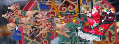 Stock image of Father Christmas / Santa, panorama banner of flying reindeer sleigh