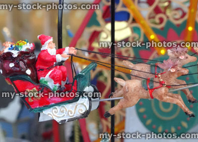 Stock image of Father Christmas / Santa and flying reindeer sleigh