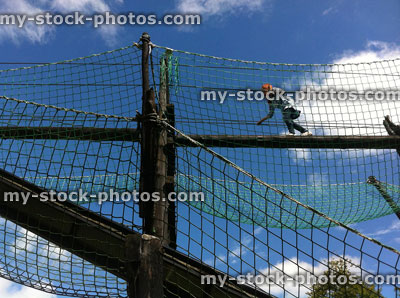 Stock image of girl on a aerial walkway