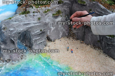 Stock image of painting homework model of beach, cliffs, coastal erosion