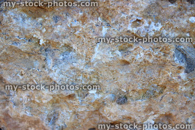 Stock image of old stone wall, sandstone, flint, background wallpaper texture