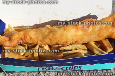 Stock image of battered cod / fish and chips in cardboard box
