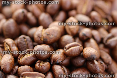 Stock image of brown Jamaican roasted coffee beans close up, fresh aroma