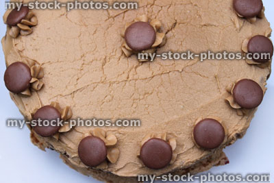 Stock image of homemade coffee cake decorated with cream / chocolate buttons