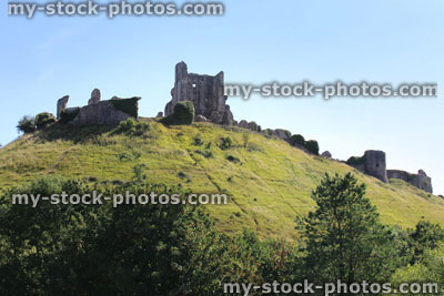 Stock image of historic 11th century Corfe Castle ruins / fortifications on hill top, Dorset, England