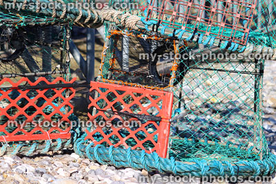 Stock image of crab and lobster baskets / traps, at fishing harbour