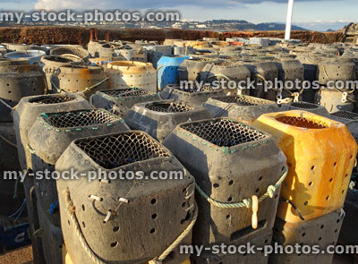 Stock image of plastic crab / lobster pots at seaside fishing harbour