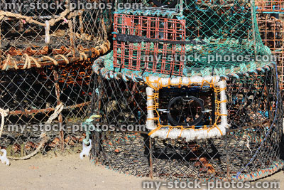 Stock image of empty crab and lobster pots / baskets, fishing harbour