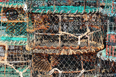 Stock image of crab pots / baskets, empty lobster traps at fishing harbour