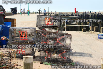 Stock image of fishing harbour at seaside town, crab / lobster pots
