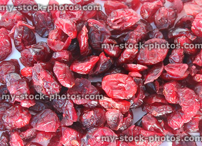 Stock image showing pile of dried cranberries / red cranberry fruit, bladder problems