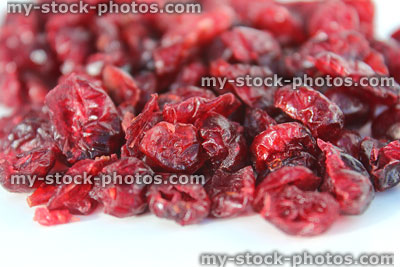 Stock image showing pile of dried cranberries / red cranberry fruit, vitamins minerals