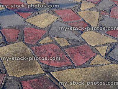 Stock image of crazy paving patio made with broken concrete slabs